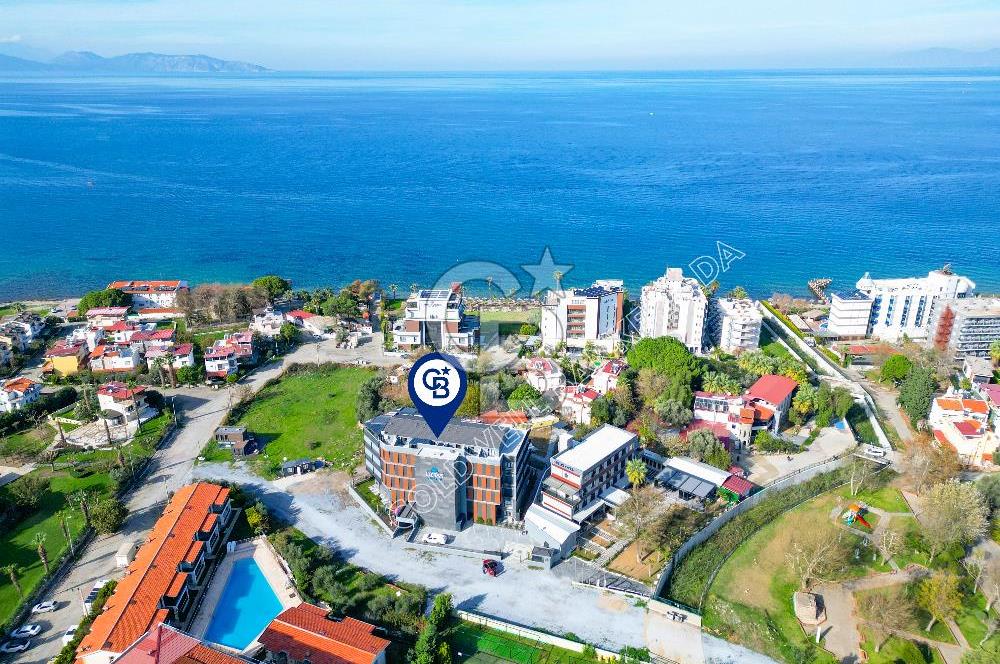 Güzelçamlı Plajına 150 Metre! Deniz Manzaralı Satılık 1+1 Daire