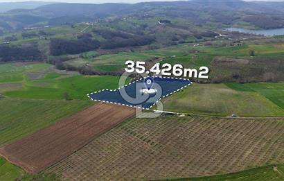 CB AKADEMİ BAĞLICA GÖL MANZARA YOL CEPHE SATILIK 35.426 m2 TARLA