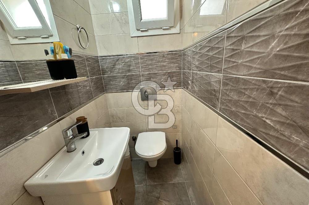 ÇEŞME ILDIR BORNOVALILAR SİTESİNDE KİRALIK BAHÇELİ 3+1 VİLLA