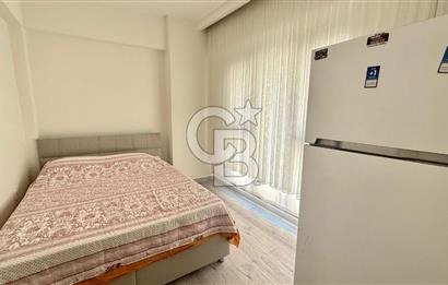 Karşıyaka Çarşı'da Eşyalı, Yerden Isıtmalı 1+1 Kiralık Daire