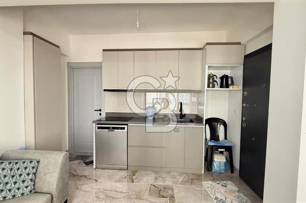 Karşıyaka Çarşı'da Eşyalı, Yerden Isıtmalı 1+1 Kiralık Daire