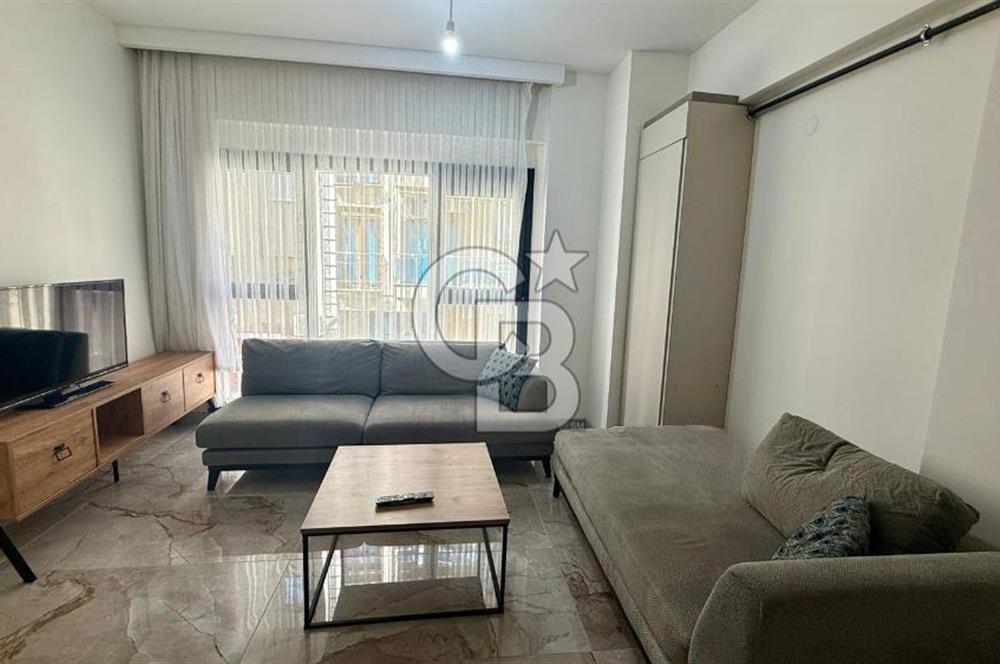 Karşıyaka Çarşı'da Eşyalı, Yerden Isıtmalı 1+1 Kiralık Daire