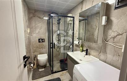 Karşıyaka Çarşı'da Eşyalı, Yerden Isıtmalı 1+1 Kiralık Daire