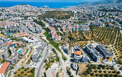 Kuşadası İkiçeşmelik'te Kiralık Köşe Konumlu Mağaza