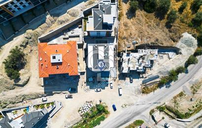 Kuşadası İkiçeşmelik'te Kiralık Köşe Konumlu Mağaza