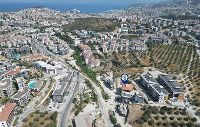 Kuşadası İkiçeşmelik'te Kiralık Köşe Konumlu Mağaza