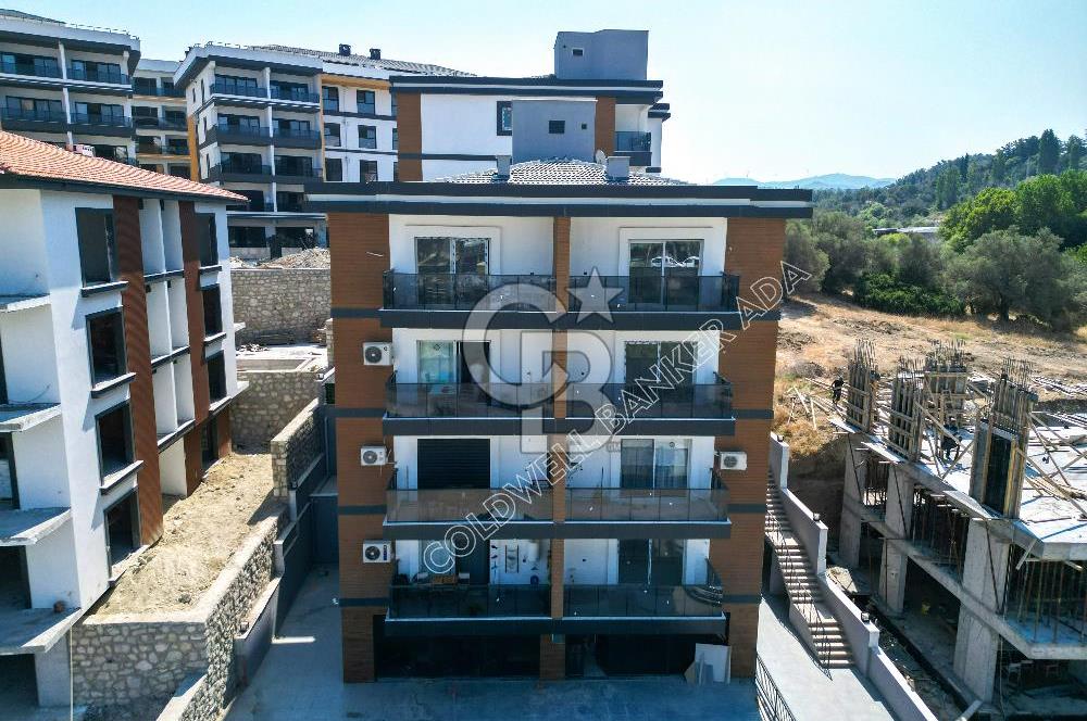 Kuşadası İkiçeşmelik'te Kiralık Köşe Konumlu Mağaza