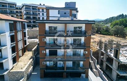 Kuşadası İkiçeşmelik'te Kiralık Köşe Konumlu Mağaza