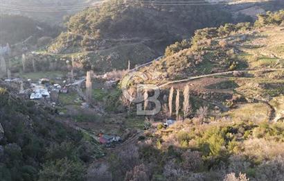 Karabağlar Kavacık'ta konut + ticari yapı kayıt belgeli satılık bağ
