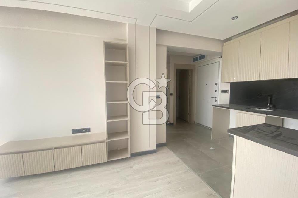 TAŞPINAR' DA SIFIR BİNA GİRİŞ KAT BAHÇE KULLANIMLI KİRALIK 1+1