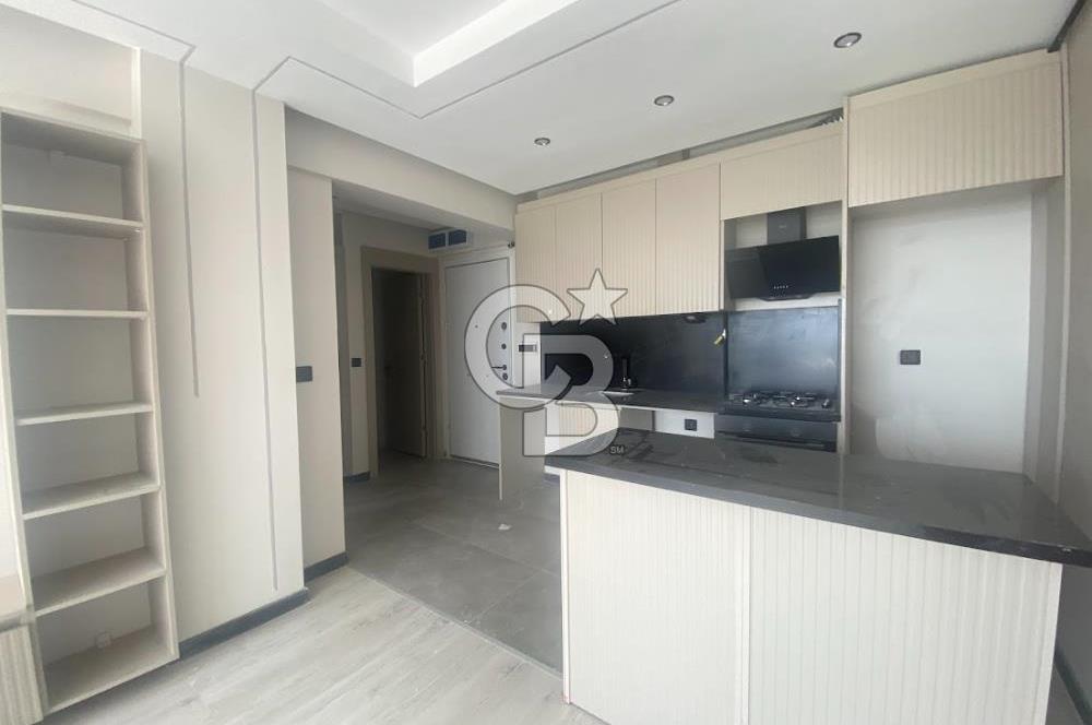 TAŞPINAR' DA SIFIR BİNA GİRİŞ KAT BAHÇE KULLANIMLI KİRALIK 1+1