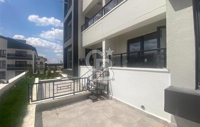 TAŞPINAR' DA SIFIR BİNA GİRİŞ KAT BAHÇE KULLANIMLI KİRALIK 1+1