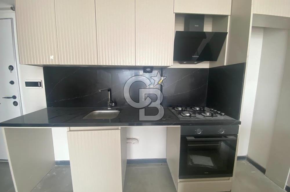 TAŞPINAR' DA SIFIR BİNA GİRİŞ KAT BAHÇE KULLANIMLI KİRALIK 1+1