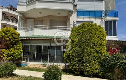 Sarımsaklı'da Plaja Sıfır Bahçe Katı 3+1 Daire