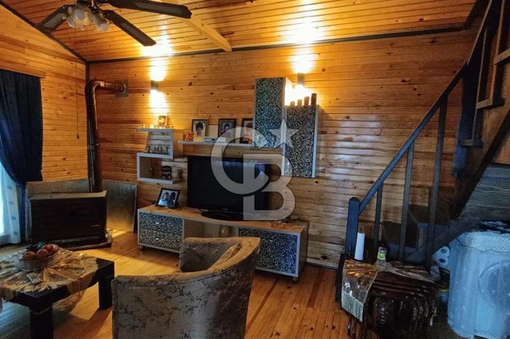 Muğla menteşe Denizova‘da satılık ahşap ev ve tarla