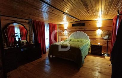 Muğla menteşe Denizova‘da satılık ahşap ev ve tarla