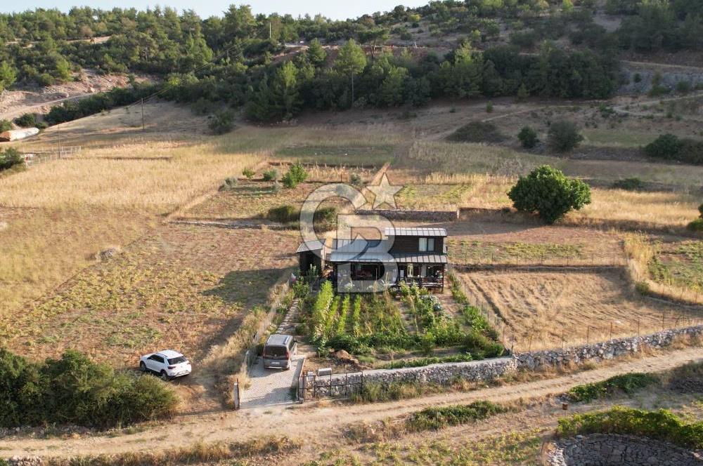 Muğla menteşe Denizova‘da satılık ahşap ev ve tarla
