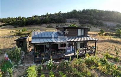 Muğla menteşe Denizova‘da satılık ahşap ev ve tarla