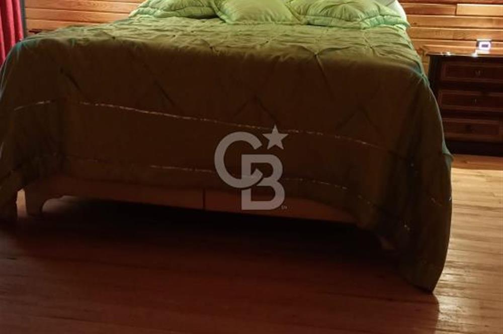 Muğla menteşe Denizova‘da satılık ahşap ev ve tarla