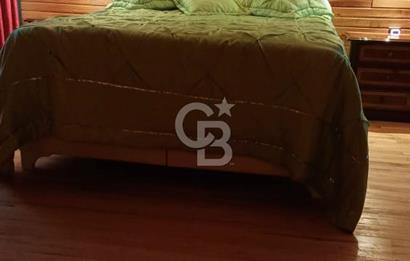 Muğla menteşe Denizova‘da satılık ahşap ev ve tarla