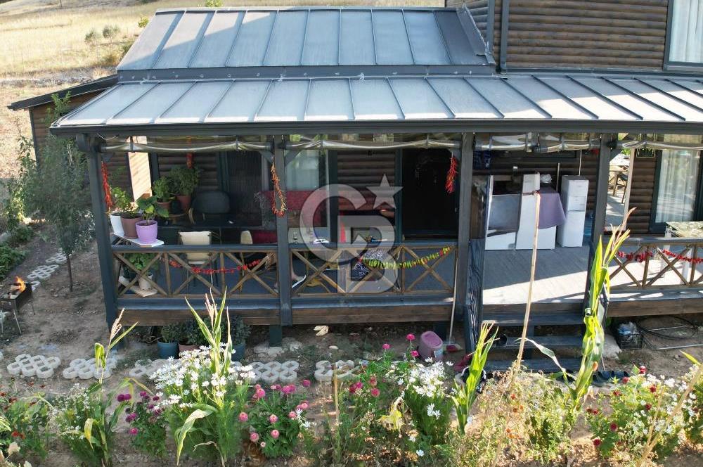 Muğla menteşe Denizova‘da satılık ahşap ev ve tarla