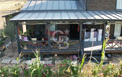 Muğla menteşe Denizova‘da satılık ahşap ev ve tarla