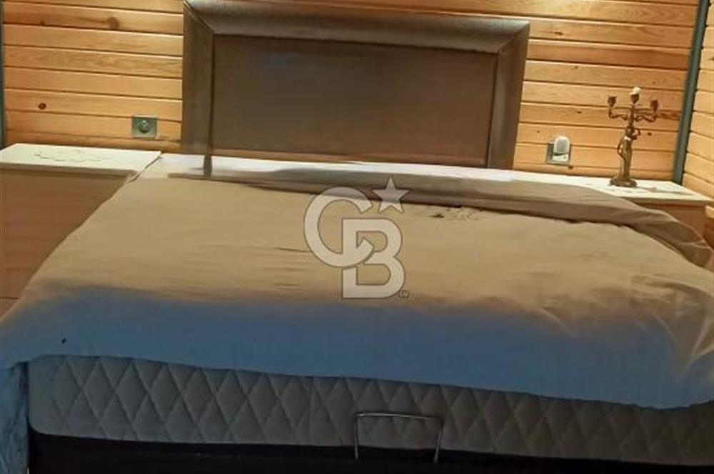 Muğla menteşe Denizova‘da satılık ahşap ev ve tarla