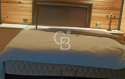 Muğla menteşe Denizova‘da satılık ahşap ev ve tarla