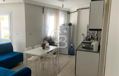 BUCA TINAZTEPE'DE KAMPÜS KARŞISI EŞYALI 1+1 SATILIK DAİRE