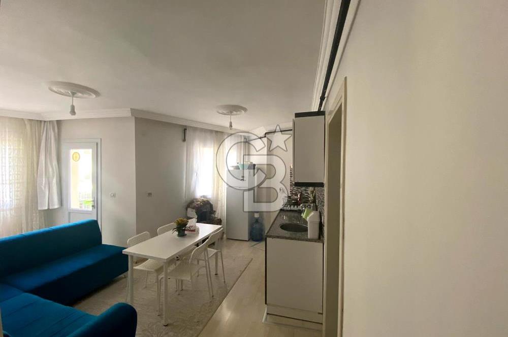 BUCA TINAZTEPE'DE KAMPÜS KARŞISI EŞYALI 1+1 SATILIK DAİRE