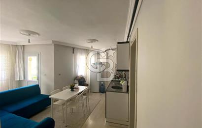 BUCA TINAZTEPE'DE KAMPÜS KARŞISI EŞYALI 1+1 SATILIK DAİRE