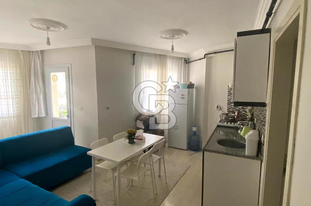 BUCA TINAZTEPE'DE KAMPÜS KARŞISI EŞYALI 1+1 SATILIK DAİRE