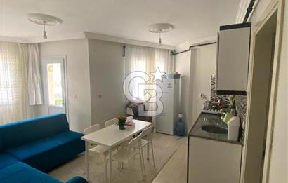 BUCA TINAZTEPE'DE KAMPÜS KARŞISI EŞYALI 1+1 SATILIK DAİRE