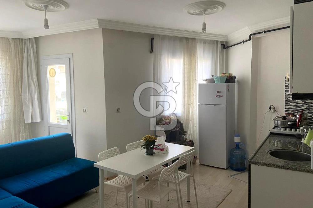 BUCA TINAZTEPE'DE KAMPÜS KARŞISI EŞYALI 1+1 SATILIK DAİRE