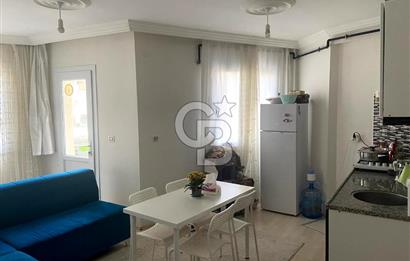 BUCA TINAZTEPE'DE KAMPÜS KARŞISI EŞYALI 1+1 SATILIK DAİRE