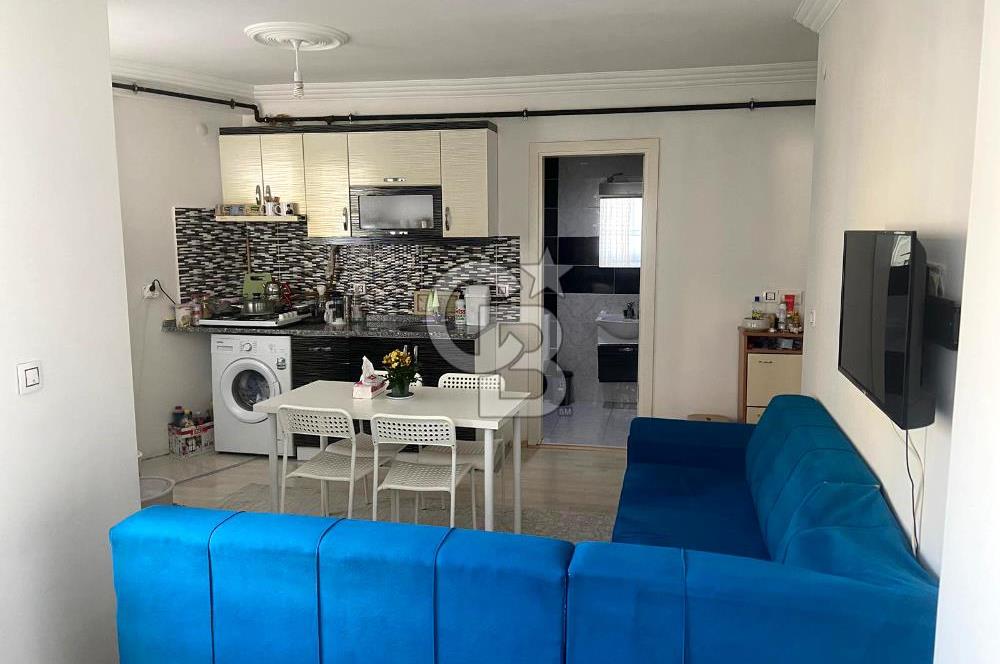 BUCA TINAZTEPE'DE KAMPÜS KARŞISI EŞYALI 1+1 SATILIK DAİRE