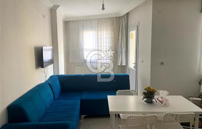 BUCA TINAZTEPE'DE KAMPÜS KARŞISI EŞYALI 1+1 SATILIK DAİRE