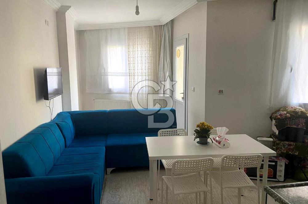 BUCA TINAZTEPE'DE KAMPÜS KARŞISI EŞYALI 1+1 SATILIK DAİRE