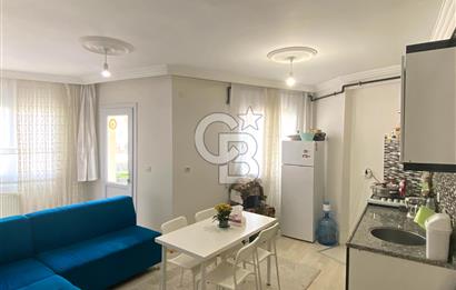 BUCA TINAZTEPE'DE KAMPÜS KARŞISI EŞYALI 1+1 SATILIK DAİRE