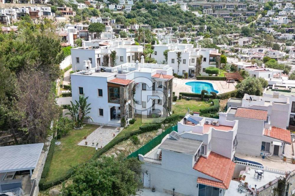Gümüşlük'te Denize sıfır Köşe Konum Bahçe Katı Daire