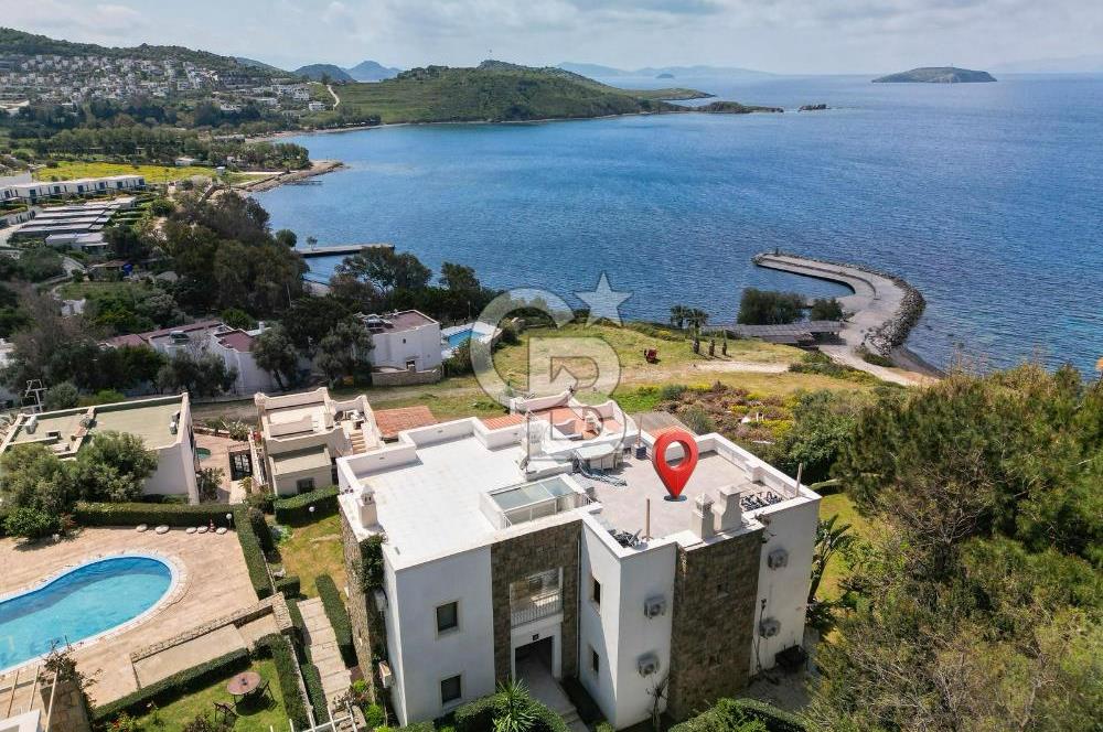 Gümüşlük'te Denize sıfır Köşe Konum Bahçe Katı Daire