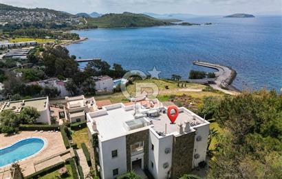Gümüşlük'te Denize sıfır Köşe Konum Bahçe Katı Daire