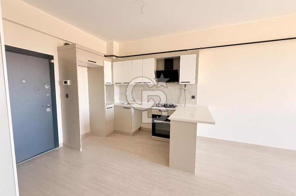 Seyrek'te Merkezi Konumda Geniş Lüx 1+1 Daire