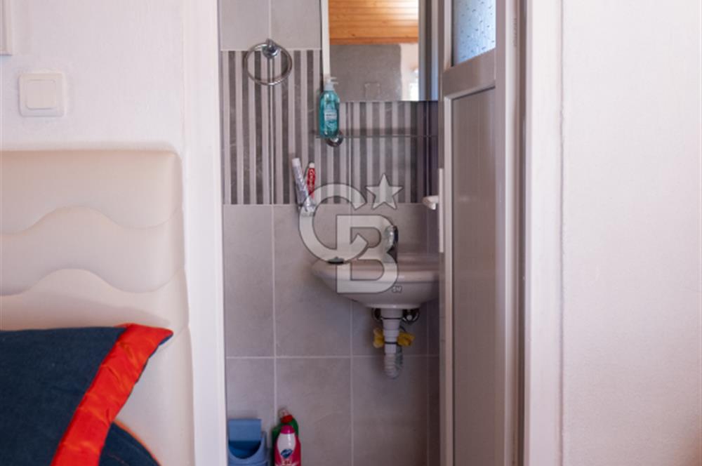 Sarıgerme'de Deniz Manzaralı Kiralık 3+1 Bahçe Tripleksi