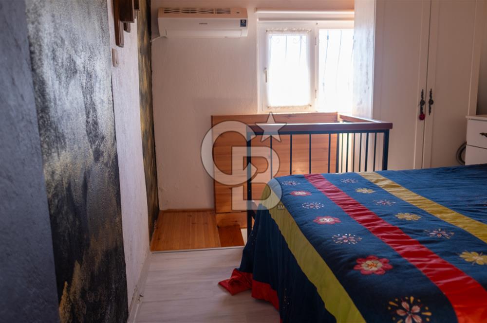 Sarıgerme'de Deniz Manzaralı Kiralık 3+1 Bahçe Tripleksi