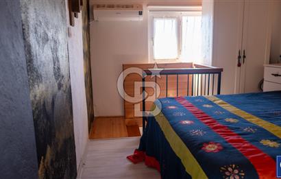 Sarıgerme'de Deniz Manzaralı Kiralık 3+1 Bahçe Tripleksi