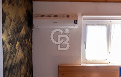 Sarıgerme'de Deniz Manzaralı Kiralık 3+1 Bahçe Tripleksi