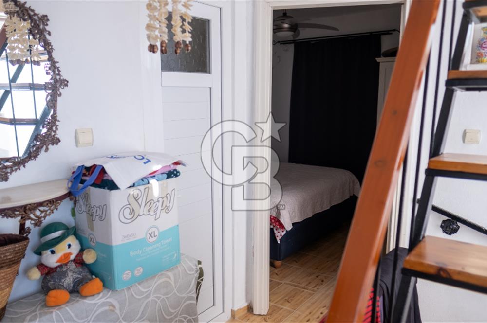 Sarıgerme'de Deniz Manzaralı Kiralık 3+1 Bahçe Tripleksi