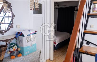 Sarıgerme'de Deniz Manzaralı Kiralık 3+1 Bahçe Tripleksi