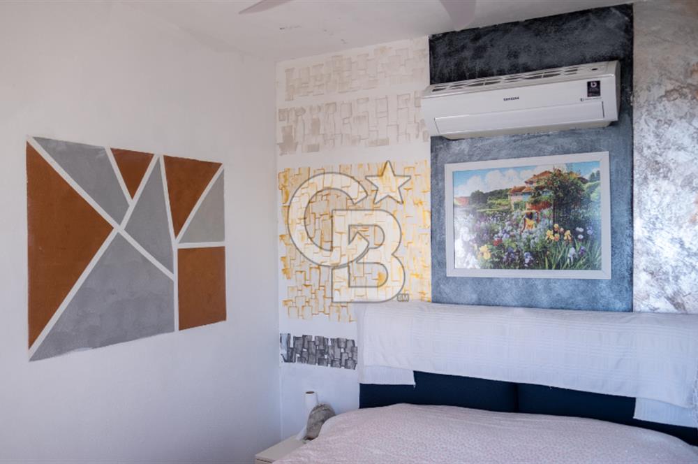 Sarıgerme'de Deniz Manzaralı Kiralık 3+1 Bahçe Tripleksi